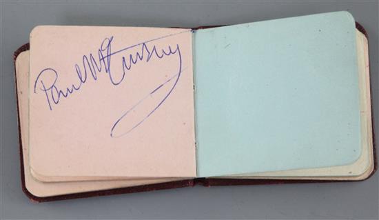 The Beatles: A small red leather bound autograph album with assorted autographs 2.5 x 2.75in.